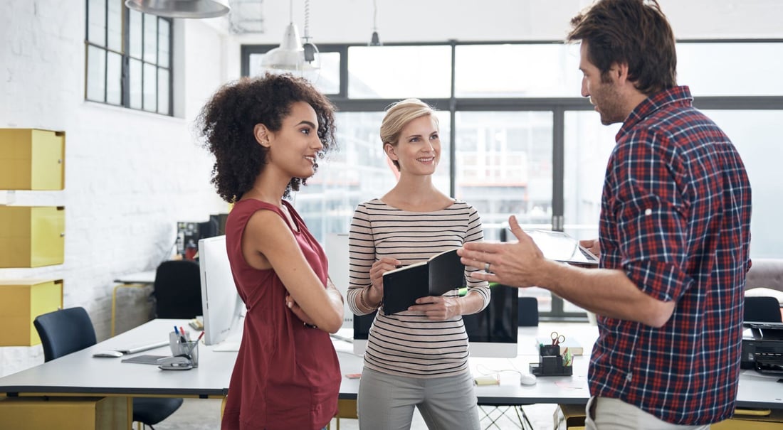 A good communicator speaking with his team